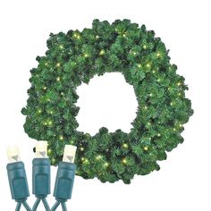 christmas wreath with lights on it and three small green cords attached to the front of each wreath