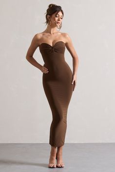 Crafted in our signature stretch jersey, this strapless dress was designed to outline your natural feminine curves. Arriving in a rich shade of chocolate, Evita is features a sweetheart neckline flourished with a twisted knot detail. Try pairing this maxi dress with strappy stilettos for the ultimate graduation or dinner party outfit.   Features - Premium stretch jersey - Bodycon fit - Sweetheart neckline - Twist detail - Sleeveless  - Invisible zip closure - Split hemline - Maxi length Sizing & fitModel is 5'8" and wears UK size 8 / US size 4 Product information Designed exclusively by Club L London Double layered with good stretch Premium jersey in Chocolate (95% Polyester, 5% Elastane)  120cm total length  SKU: CL128975067 Dinner Party Outfit, Dinner Party Outfits, Black Dress Prom, Strappy Stilettos, Black Tie Gala, Party Dress Long Sleeve, Christmas Party Dress, Bridesmaid Outfit, Black Sequin Dress