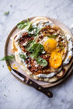 an image of food on a plate with utensils