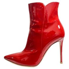 Gianvito Rossi Patent Leather Ankle Boots Glossy red boots designed with pointed toe and stiletto heel. Featuring zip fastening to the side, leather lining and soles. Size – 40.5 Condition – Very Good Composition – Patent Leather Comes with – Box Winter Heeled Boots With Red Sole And Pointed Toe, Red Patent Leather High Heeled Boots, Red Pointed Toe Heeled Boots For Party, Red Fitted High Heel Mid-calf Boots, Fitted Red High Heel Mid-calf Boots, Red Fitted Mid-calf Boots With High Heel, Fitted Red Mid-calf Boots With High Heel, Fitted Patent Leather Boots With Red Sole, Red Fitted Patent Leather Heeled Boots