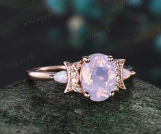 - Metal: Solid gold(10K/14K/18K white/yellow/rose gold),925 sterling silver,platinum available- Main Stone: 6x8mm oval cut Lavender Amethyst- Accent Stone: 2x4mm pear lab opals, round moissanites and round opals- Can be personalized: Yes Elegant 14k Gold Crescent Ring, Elegant Crescent Gemstone Ring, Elegant Crescent Ring For Anniversary, Elegant Crescent Shaped Rings For Anniversary, Dainty Crescent Wedding Rings, Elegant White Crescent Rings, Rose Gold Crescent Wedding Ring, Retro Moon, Amethyst Engagement Ring