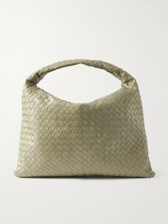 This beautifully crafted tote is undoubtedly Bottega Veneta - it's woven from strips of sage-green leather using the house's signature intrecciato technique. Defined by its slouchy shape, it's sized to perfectly hold a laptop, planner and water bottle and has a curved shoulder strap. Luxury Green Woven Leather Bags, Bottega Veneta Bag Tote, Craft Tote, Gucci Eyewear, Bottega Veneta Intrecciato, Large Shoulder Bags, Green Bag, Green Leather, Bottega Veneta