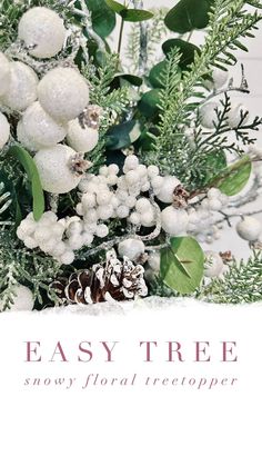 an easy tree snow - floral arrangement with pine cones, berries and evergreen leaves is featured in this postcard