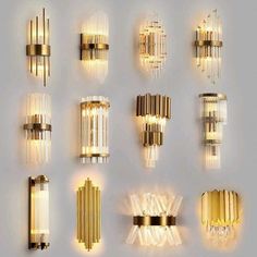 an assortment of modern wall lights in various shapes and sizes, all with glass shades