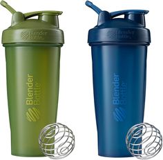 two blender bottles with lids and straws on the top one is green, the other is blue