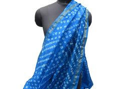 Pattern - original bandhani/ bandhej, tie and dye scarf. Ideal for - unisex. Occasion - formal or casual. Fabric - art silk with a nice fall. Color - blue and white. It is hand-dyed. Size - 44 x 88 inches (approx). Care - gentle hand wash. For more such scarves please visit- https://www.etsy.com/in-en/shop/vibrantscarves?ref=seller-platform-mcnav&section_id=22931635 For all orders, $120 and above, it will be express delivery through DHL confirmed delivery within 4 to 5 working days. Silk Scarf Fashion, Scarf Gift Ideas, Silk Scarf Style, Pompom Scarf, Scarf Fashion, Scarf Silk, Fashion Scarf, Pink Scarves, Scarf Tying