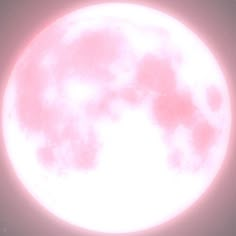 the bright pink moon is shining brightly in the sky