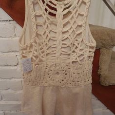 Sexy, Ivory Top Woven/Crochet Back. Beige Hollow Out Tops For Summer, Beige Hollow Out Summer Top, Beige Hollow Out Top For Summer, Spring Hollow Out Beige Top, Beige Hollow Out Top For Spring, Spring Beige Hollow Out Top, Beige Stretch Crochet Top For Vacation, Sleeveless Beige Crochet Top For Day Out, Beige Sleeveless Crochet Top For Day Out