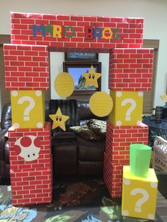 a child's play area made out of cardboard blocks