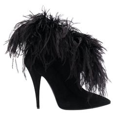 Saint Laurent Zizi 110 Black Suede High Stiletto Heel Ankle Boot Saint Laurent's FW19 runway show saw legs take center stage, with models wearing tiny shorts and mini skirts – the perfect choice to show off this season's statement footwear. Crafted from black suede, leather and feathers, these Zizi 110mm booties feature a pointed toe and a high stiletto heel. Brand new. Made in Italy. Size: 38 (FR) Fit: Saint Laurent shoes usually run small. Please order a 1/2 size larger than you typically wear Saint Laurent Runway, Saint Laurent Boots, Tiny Shorts, Attractive Clothing, Bond Girl, Womens Black Booties, John Fluevog, Yves Saint Laurent Shoes, Couture Mode