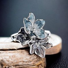 Introducing our Unique Women Ring -- a masterpiece of elegance crafted in genuine 925 sterling silver. This exquisite ring is a celebration of timeless design, making it the perfect accessory for those who appreciate the finer things in life. 🌸 Floral Delight: The delicate flower design adds a touch of femininity and charm to this unique ring, making it a standout piece in your jewelry collection. Each petal is intricately crafted, creating a symbol of natural beauty that transcends trends. 💍 Silver Vintage Flower Ring For Gift, Vintage Silver Flower Ring For Gift, Vintage Silver Flower Ring Gift, Elegant Sterling Silver Round Enamel Ring, Formal Silver Enamel Ring In Sterling Silver, Fine Jewelry Silver Enamel Ring Hallmarked, Silver Enamel Ring For Anniversary, Silver Enamel Ring For Anniversary - Fine Jewelry, Silver Enamel Ring Hallmarked Fine Jewelry