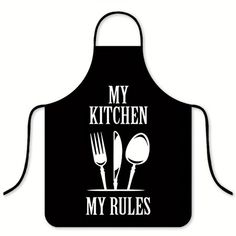 a black apron that says, my kitchen is my rules with spoons and forks on it