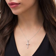 Beautifully designed with shine and grace, this diamond-cut cross pendant in white gold expresses your faith in elegant style. Crafted in cool 10K white gold This classic cross showcases a diamond-cut center glistening between polished beveled edges. Lovely worn alone or layered with your other favorite chains or necklaces The pendant suspends along an 18.0-inch cable chain that secures with a spring-ring clasp. Diamond Cut Cross Pendant Necklace, Classic Diamond Cut Cross Necklace, Classic Diamond White Crucifix Cross Necklace, Brilliant Cut Sterling Silver Cross Pendant Necklace, Sterling Silver Brilliant Cut Cross Pendant Necklace, Elegant Diamond Cut Cross Necklace In Diamond White, Sterling Silver Diamond Cut Cross Pendant Necklace, Classic Diamond Cut Cross Necklace In White Gold, Sterling Silver Cross Necklace With Diamond Cut