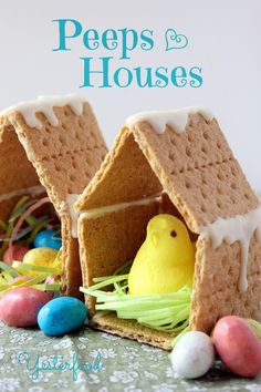 peeps and houses made out of bread with eggs in the grass next to them