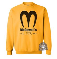 "Mcdowells Sweatshirt, 80s Movie Sweater, Funny Sweaters, Vintage Sweatshirt, For Men and Women, Foodie Gift, Retro Nostalgia [ QUALITY OF OUR SWEATSHIRTS & INK ] WARM, Super-soft Fleece Crewneck Sweatshirt. Relaxation done right! These cozy sweaters are made from a 50/50 cotton / polyester fabric that's as soft and comfy as it is durable and good-looking. Double needle stitching for added durability without sacrificing comfort. Comfortable set-in sleeves, Athletic rib-knit cuffs, and waistband Earth Clothes, Sweat Vintage, Cool Sweatshirts, Sweaters Vintage, Funny Sweaters, Shirt Designs For Men, Gold Shirt, Cotton Polyester Fabric, Retro Nostalgia