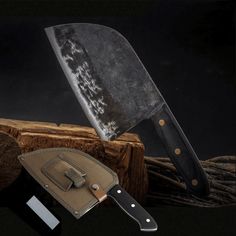 an image of a knife and sheath on a black background