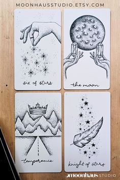 four cards with different designs on them and the words moondusts written in black ink