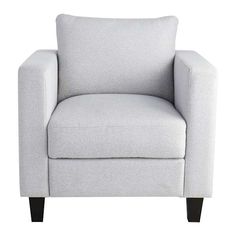 a light gray chair with black legs and a white pillow on the armrests