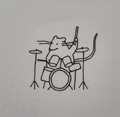 a drawing of a mouse playing drums