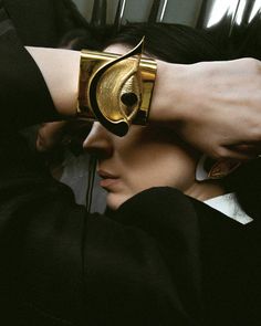 The Bracelet is fully handcrafted ,gold plated brass with black enamel detail.Nino Sepo was born 1989, Tbilisi Georgia. After graduating from Tbilisi State Academy of Arts Nino created our label under the same name. "For me creating fashion is like a game, I play with different materials, and forms. It's like creating a story." Fire Necklace, Weather Science, Butterfly Effect, Long Sleeve Maxi, New Years Eve Party, Look At Me, Edgy Fashion, Black Enamel, Long Sleeve Maxi Dress