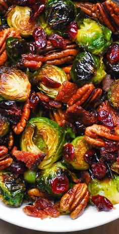 Brussels sprouts with Bacon, Pecans, Cranberries, and Balsamic Glaze. Brussel Sprouts With Pecans, Roasted Brussels Sprouts With Bacon, Christmas Side Dish, Veggie Side Dish Recipes, Brussels Sprouts With Bacon, Christmas Side, Christmas Side Dishes, Roasted Vegetable Recipes, Roasted Brussels Sprouts