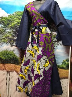 African wrap dress. High quality wrap dress with flowy sleeves for weddings, African events.  Unique one size dress fits up to 2x.  Has Pockets and midi headwrap. Fabric is 100% cotton print. Bohemian Fitted Wrap Dress With Surplice Neckline, Bohemian Flowy Wrap Dress With Surplice Neckline, Flowy Faux Wrap Maxi Dress, Flowy Faux Wrap Dress, Blue Wrap Dress With Tie Waist, Blue Faux Wrap Dress For Spring, Fitted Wrap Dress With Kimono Sleeves For Summer, Fitted Summer Wrap Dress With Kimono Sleeves, Flowy Wrap Dress With Tie Waist