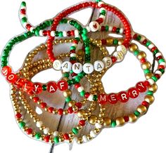 Holiday Jewelry With Letter Beads, Holiday Jewelry With Round Letter Beads, Holiday Jewelry With Letter Round Beads, Gold Beaded Christmas Bracelets, Gold Beaded Bracelets For Christmas, Gold Beaded Bracelets For Holiday, Handmade Gold Beaded Bracelets For Holidays, Handmade Gold Beaded Bracelets For Christmas, Adjustable Gold Beaded Bracelets For Holiday