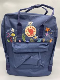 #embroidery #handmade #handembroidery #totebagembroidery #kanken #kånken #kankenbackpack #kankenclassic #kankenart #kankenmini #kankenthailand #kankenbag #kankensling #fjallravenkanken #kankenaesthetic #diy #fjällräven #fjallraven #fjallravenclassic #fjällrävenkånken #sewing #embroiderydesign #embroideryart #embroiderylove #embroiderydesigns #embroiderypattern Kanken Backpack Embroidery, Embroidered Kanken, Backpack Kanken, Kanken Embroidery, Backpack Embroidery, Mochila Fjallraven Kanken, Colorful Jellyfish, Embroidered Backpack, Dog Memorial Gift