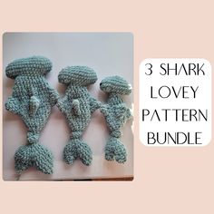 three small crocheted sea creatures sitting next to each other