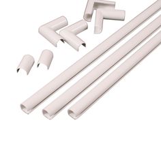 four white plastic dows, one with an arrow and the other has three pieces