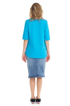 The Esteez elbow sleeve cotton tunic top is a versatile, lightweight shirt, with a loose fit. Its pretty cuff sleeve, and rounded hem is feminine and flattering for all body types. A perfect t-shirt for all day comfort and style. Pair it with a cute skirt or a pair of jeans and you have got a winning casual outfit. Crew neck is modest but will not feel ‘chokey’ Esteez blend of fabric is very soft with a good stretch True to size t-shirt Machine wash cold, hang/line to dry Models are 5’5" and 5'7 Blue Tops With Roll-up Sleeves For Spring, Blue Shirt With Roll-up Sleeves And Shirttail Hem, Summer Half-sleeve Blouse With Roll-up Sleeves, Summer Blouse With 3/4 Roll-up Sleeves, Summer Tops With Roll-up 3/4 Sleeves, Summer Half Sleeve Blouse With Roll-up Sleeves, Blue Relaxed Fit Blouse With Cuffed Sleeves, Blue Blouse With Cuffed Sleeves Relaxed Fit, Blue Blouse With Relaxed Fit And Cuffed Sleeves