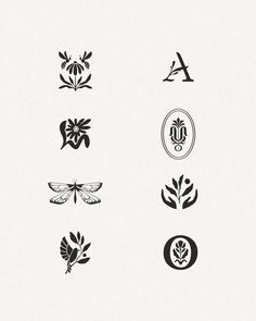 some type of logos that are black and white, with different designs on the bottom