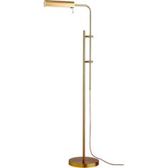 a gold floor lamp with a white background