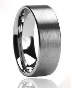 a stainless steel ring with an inscription on the inside and inlaying to it