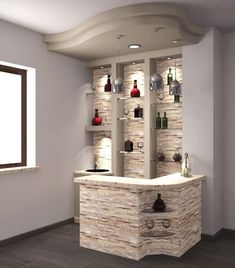 an empty room with shelves and bottles on the wall