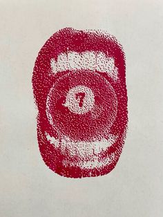 a red and white painting with dots on it's face in the shape of an eye