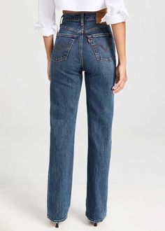 Levi's® highest high rise yet. The Ribcage Jean—with its soaring 12-inch rise—has become a hip-slimming, waist-defining, leg-lengthening obsession. This fit will show off your figure and make you feel as amazing as you look.Slim through your hip and thigh.Super high rise: 12.125".Straight leg. Button fly.99% cotton, 1% elastane.Heavyweight denim, stretch. Model is wearing a size 26. Levi's Ribcage, Full Length Jeans, Levis Ribcage, Ribcage Jeans, Skandinavian Fashion, Vintage Crewneck, Valley View, Black Midi Skirt, Mode Streetwear