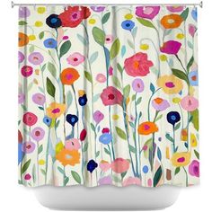 a shower curtain with colorful flowers on it