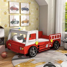 a child's bedroom with a red fire truck bed