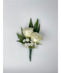 a bouquet of white roses and baby's breath flowers on a white background with greenery