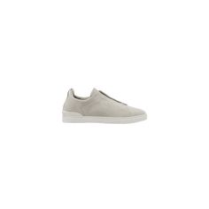 ZEGNA "Triple Stitch™" sneakers in suede, leather, and vinyl  Flat heel Round toe Elastic band vamp Slip-on style  Lining: Leather Rubber outsole Made in Italy Zegna Men, Elastic Band, Suede Leather, Low Top, Top Sneakers, Tops Designs, In Italy, Slip On, Italy