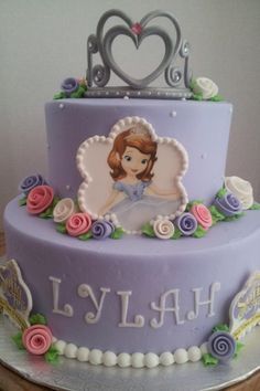 a purple cake with a princess on it