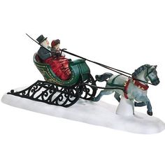 a figurine of a man riding in a sleigh pulled by a horse