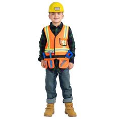 a young boy wearing an orange safety vest and yellow hard hat, standing in front of a white background