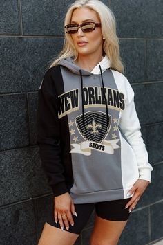 This Adult Classic Colorblock Hoodie Unisex Fit is the perfect way to show off your NFL team spirit in style! This on-trend, fashion-forward hoodie is designed with a classic colorblock pattern and features the iconic NFL logo. It's made from a soft and comfortable fabric and has a unisex fit, making it perfect for any fan. Whether you're cheering on your team from the stands or just want to show off your team pride, this hoodie is the perfect way to do it. Colorblock Hoodie, Nfl Logo, New Orleans Saints, Workout Hoodie, New York Jets, Nfl Teams, New York Giants, New England Patriots, College Outfits