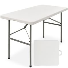 a white folding table with black legs and an empty card board next to the table