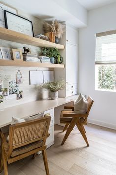 a home office with wooden chairs and shelves