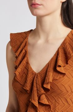 Textured fabric and ruffle trim add effervescent charm to this sleeveless V-neck top. 13" to 27" length (size Medium) V-neck Sleeveless 95% polyester, 5% elastane Hand wash, line dry Imported V-neck Ruffled Tank Top For Spring, Spring V-neck Ruffled Tank Top, Spring V-neck Tank Top With Ruffles, Fitted V-neck Tank Top With Ruffles, Astr The Label, Contemporary Accessories, Designer Clothes For Men, Comfortable Dress, Women's Summer Fashion