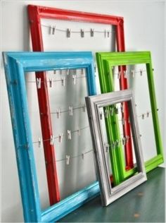 three frames with clothes pins attached to them