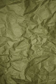 an old crumpled paper textured with brown paint